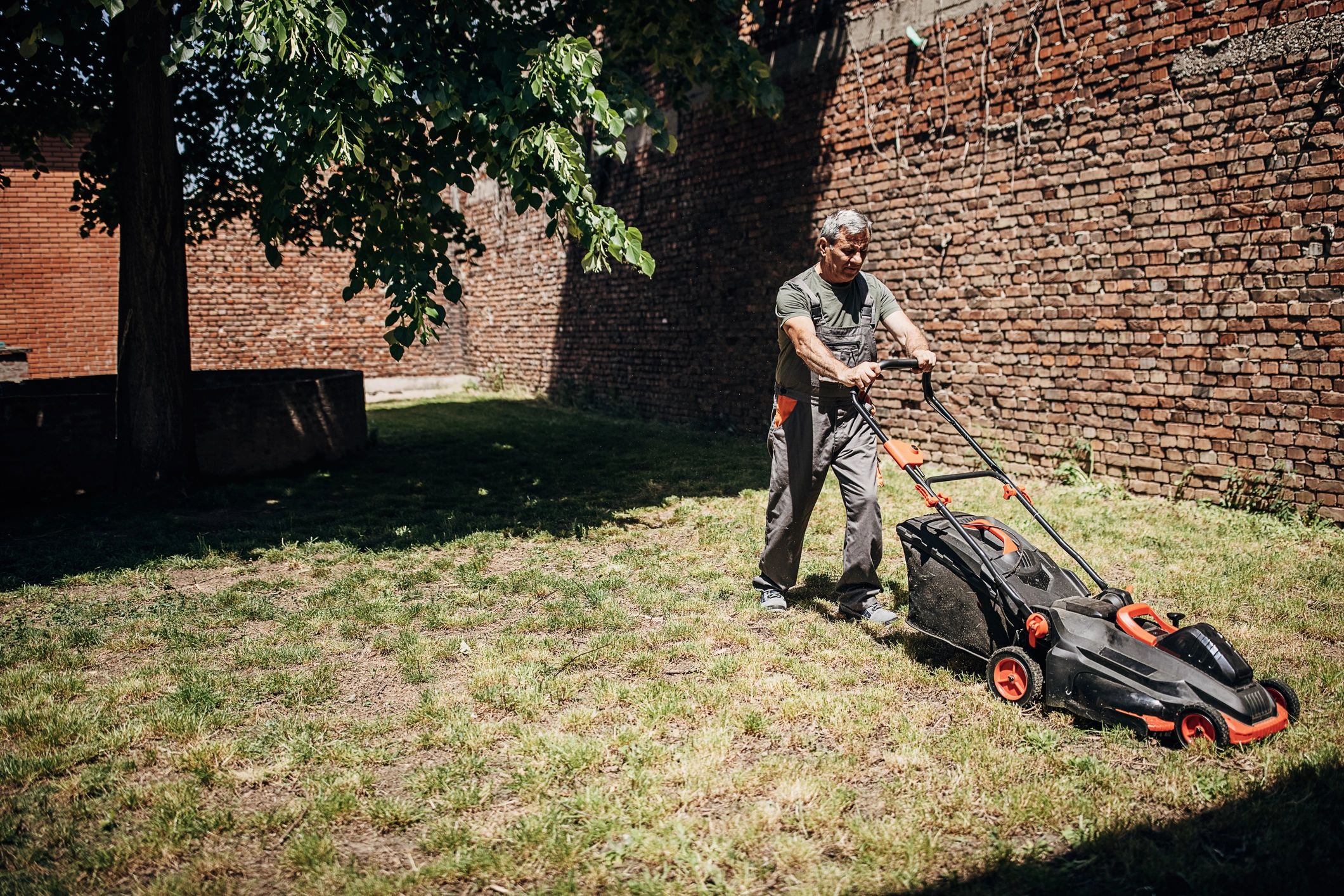 Residential lawn being mowed